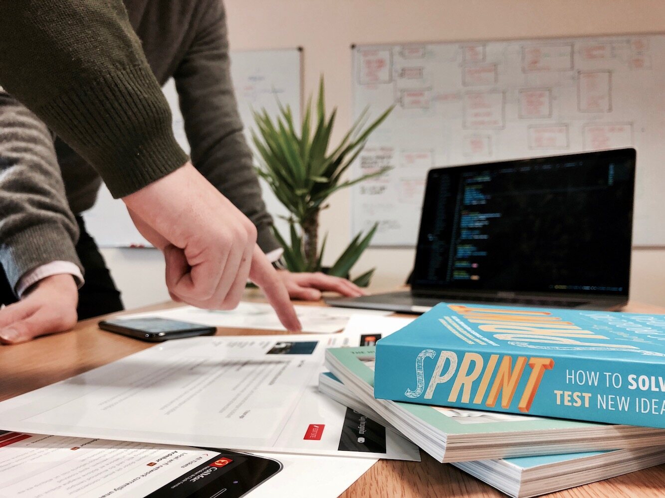 the mmtm team working at a table