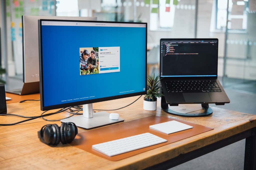 The Rota 2.0 login screen on a desk monitor